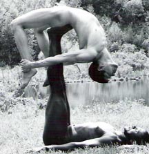 Two guys in partner yoga